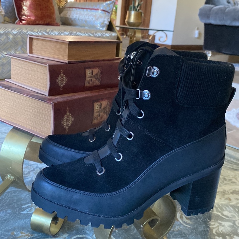 Woman lace up uggs boots